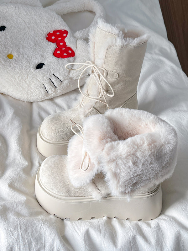 White fur-lined reversible snow boots