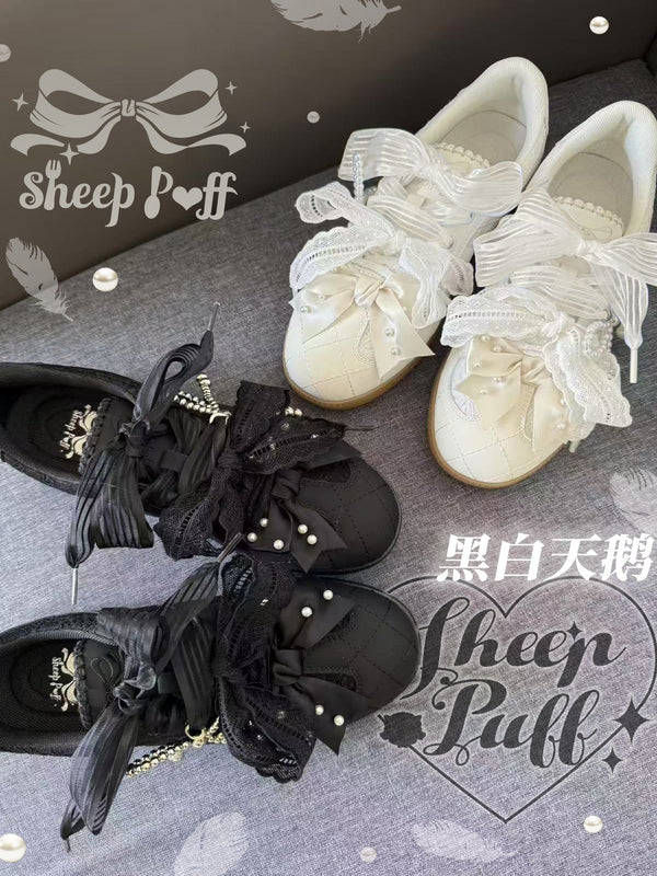 Black and white swan cotton sneakers