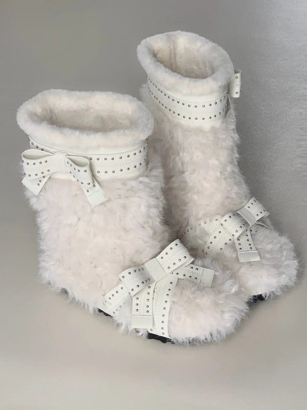 Women's snow boots with winter bow